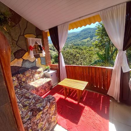 Pousada Rancho Das Flores Espera Feliz Bagian luar foto