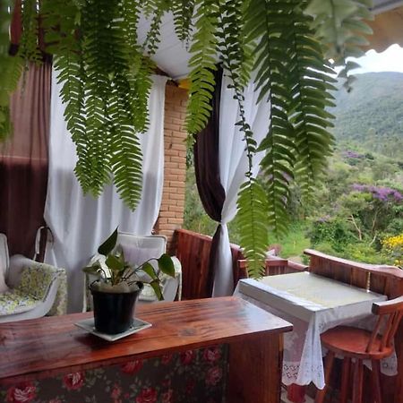 Pousada Rancho Das Flores Espera Feliz Bagian luar foto