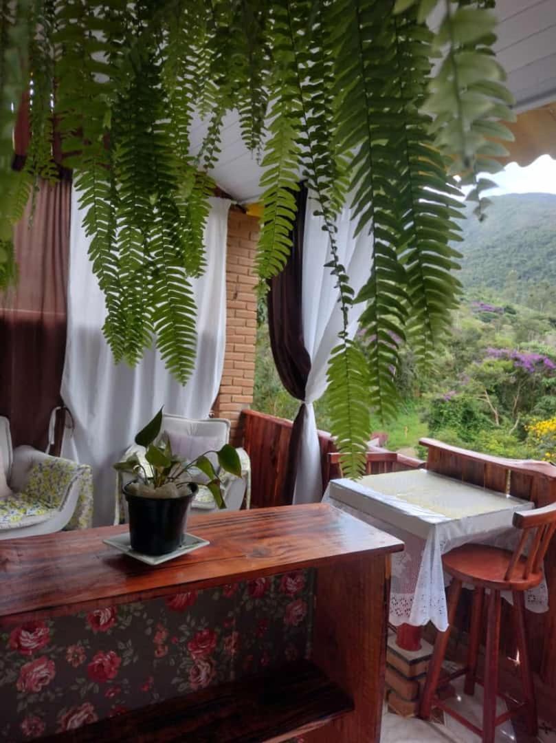 Pousada Rancho Das Flores Espera Feliz Bagian luar foto