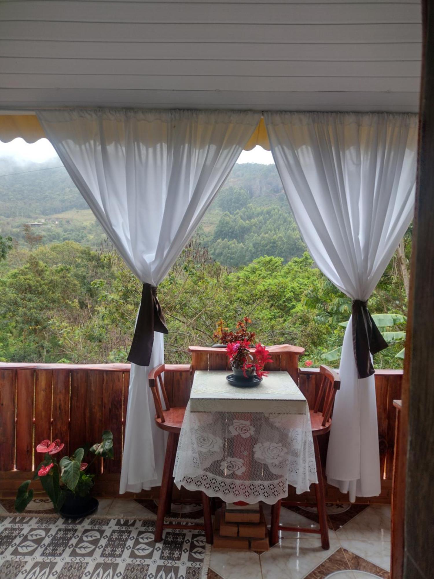 Pousada Rancho Das Flores Espera Feliz Bagian luar foto