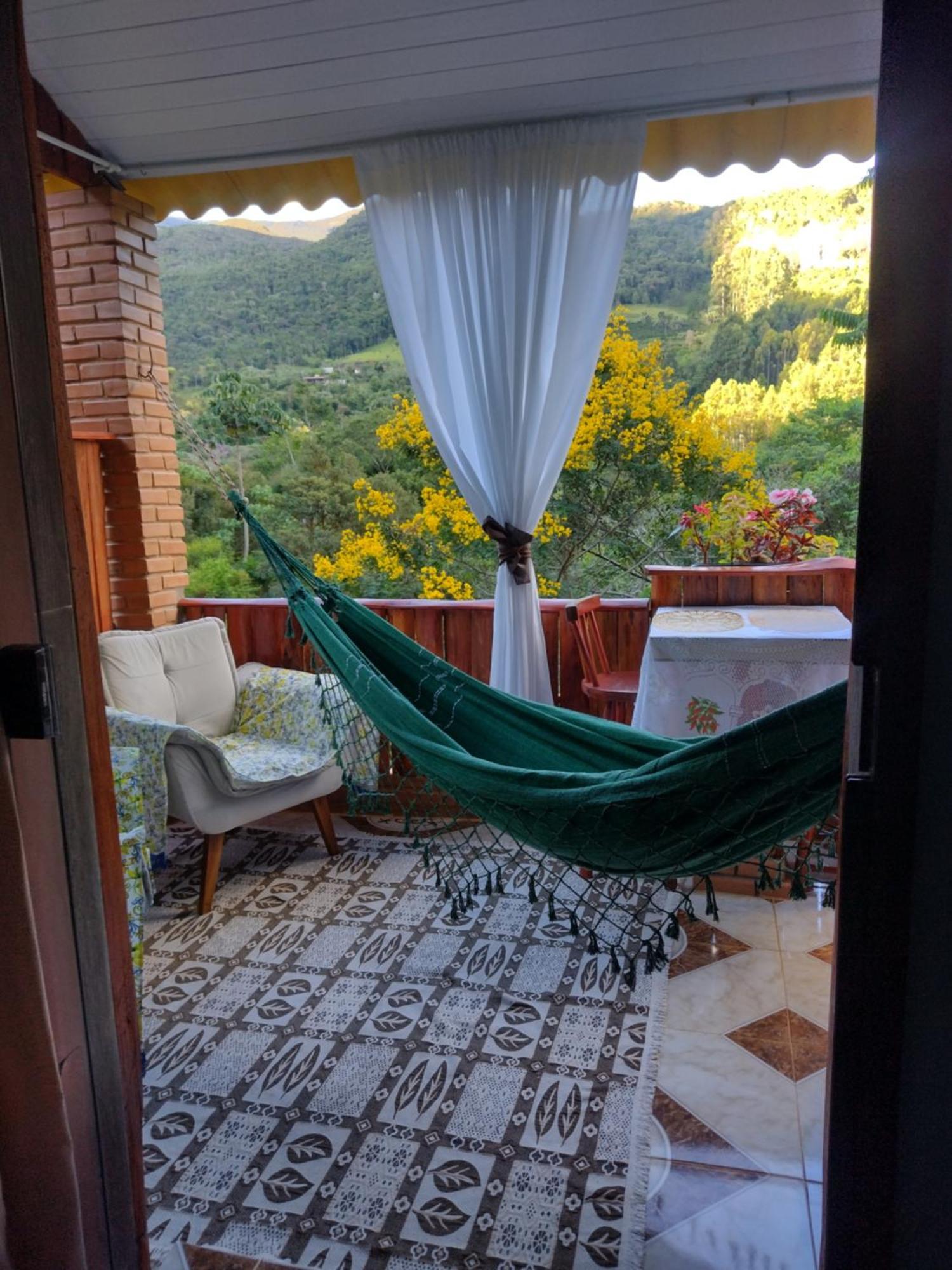 Pousada Rancho Das Flores Espera Feliz Bagian luar foto